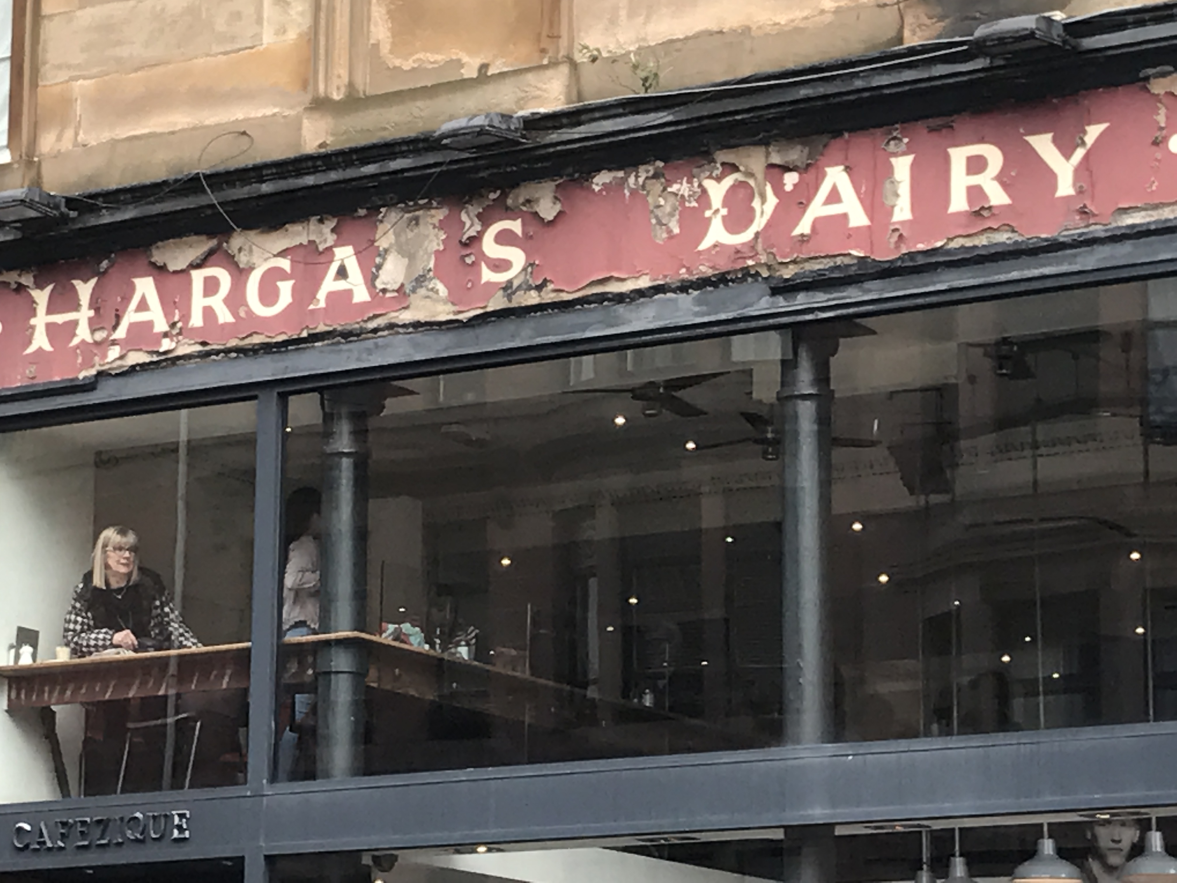 The old Hargans Dairy signage above Cafézique in the West End